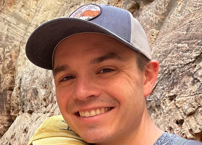 Kurt Zepeda outdoors, smiling